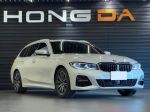 BMW 320i M Sport Touring 白...